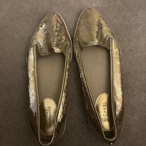 Brand new Michael Kors all sequin flat shoes never been worn. They’re too cute.